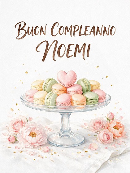 Alzatina in vetro con soffici macarons pastello e un macaron a forma di cuore, boccioli di rosa cipria e coriandoli dorati su fondo candido.