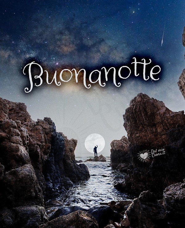 Immagine della buonanotte con luna tra gli scogli